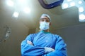 Your life is in good hands. Low angle shot of a surgeon in an operating room. Royalty Free Stock Photo