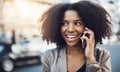 Your offer sounds too interesting to pass on. a young businesswoman talking on a cellphone in the city. Royalty Free Stock Photo