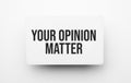 Your Opinion Matter sign on notepad on the white backgound