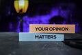 Your Opinion Matters on the sticky notes with bokeh background Royalty Free Stock Photo