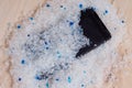 Your phone wet - putting it in a bag of silica gel filler to absorb the moisture. Royalty Free Stock Photo