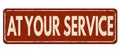 At your service vintage rusty metal sign