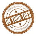 ON YOUR TOES text on brown round grungy stamp