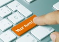 Your turn! - Inscription on Orange Keyboard Key