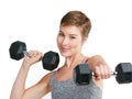 When your willower is as strong as your body. Studio portrait of a fit young woman working out with dumbbells against a Royalty Free Stock Photo
