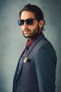 When youre this cool...Studio portrait of a stylishly dressed handsome young man wearing sunglasses. Royalty Free Stock Photo