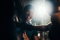 Youre doing amazing. a handsome young male fitness instructor coaching a female boxer in a gym.