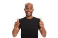 Youre doing great. Studio portrait of a handsome african american man giving the thumbs up isolated on white.