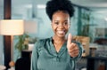 Youre doing so well, keep it up. Portrait of a young businesswoman showing thumbs up in an office. Royalty Free Stock Photo