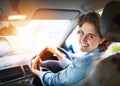 Youre in the drivers seat now. Portrait of a happy young woman driving a car. Royalty Free Stock Photo