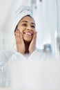 Youre the fairest of them all. a young woman going through her beauty routine at home. Royalty Free Stock Photo