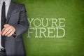 Youre fired on blackboard Royalty Free Stock Photo