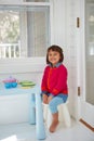 Youre invited to my tea party. Portrait of an adorable little girl having a tea party at home.