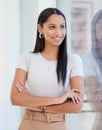 Youre looking at the superwoman of business. a young businesswoman in her office.