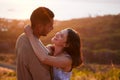 Youre my favourite person. an affectionate young couple embracing lovingly at sunset. Royalty Free Stock Photo