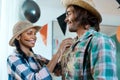 Youre a needle in a haystack. a young couple getting dressed for halloween at home. Royalty Free Stock Photo