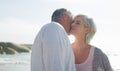 Youre still the best thing Ive ever had. an affectionate senior couple having an intimate moment at the beach on a Royalty Free Stock Photo