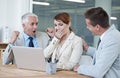 Youre the top employee again. surprised colleagues looking at a laptop in a boardroom. Royalty Free Stock Photo