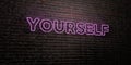 YOURSELF -Realistic Neon Sign on Brick Wall background - 3D rendered royalty free stock image
