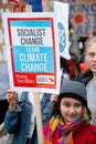 Youth activist with banner at Climate Change demonstration in London.