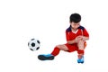 Youth asian soccer player with pain in knee joint. Full body.