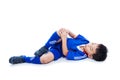 Youth asian soccer player with pain in knee joint. Full body.