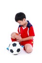 Youth asian soccer player with pain at leg. Full body.