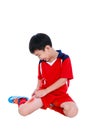 Youth asian soccer player with pain in thigh.