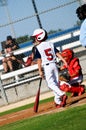 Youth baseball boy about to bat looking at pitcher. Royalty Free Stock Photo