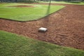 Youth baseball infield from first base side in morning light Royalty Free Stock Photo