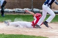 Base runner using aggresive tactics Royalty Free Stock Photo