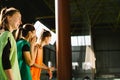 Youth female soccer team. Reserve players support team from bench. Girls ready to play european football match. Fan and Royalty Free Stock Photo