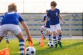 Youth Footballer Running With Ball on Training Time