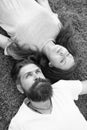 Youth and freedom. Couple in love relaxing lay meadow. Freshness and peace. Hipster bearded man and girl happy carefree