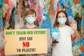 Youth generation protesting against plastic pollution Royalty Free Stock Photo