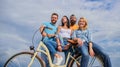 Youth likes cruiser bike. Cycling modernity and national culture. Company stylish young people spend leisure outdoors Royalty Free Stock Photo