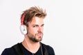 Youth music taste. Student handsome guy listening music. Modern people concept. Man tousled hairstyle wear plastic Royalty Free Stock Photo