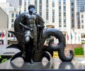 Youth Prometheus Creation Statue with face mask at Rockefeller Center in Midtown Manhattan during Coronavirus pandemic in New Yor