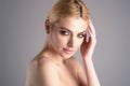 Youth and skin care concept. Photo of sensual model isolated on studio background. Close up portrait of beautiful woman Royalty Free Stock Photo