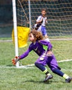 Youth Soccer Football Goalie Going for The Save Royalty Free Stock Photo