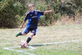Youth Soccer Football Player Kicks the Ball