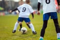 Youth Soccer Sport Background. Football Player Running with the ball Royalty Free Stock Photo