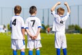 Youth sport team players support teammates on the sports competition Royalty Free Stock Photo