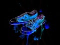 youth sports shoes on a black background, watercolor, illustration Royalty Free Stock Photo