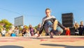 Youth street dances. A young girl performs dance moves Royalty Free Stock Photo