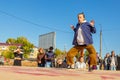 Youth street dances. A young girl performs dance moves Royalty Free Stock Photo