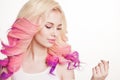 Youth women with colored curly hair on the white background. Beauty. Isolated. Studio. Gradient. Copy-space