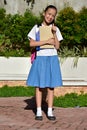 Youthful Filipina Girl Student With Thumbs Up Wearing School Uniform Standing Royalty Free Stock Photo