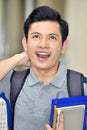 Youthful Filipino Male Student Laughing