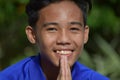 Youthful Filipino Teen Boy In Prayer